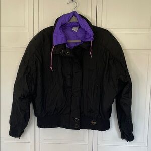 Vintage Women's Rodeo Black Ski Jacket with Purple Lining and Star Detail
